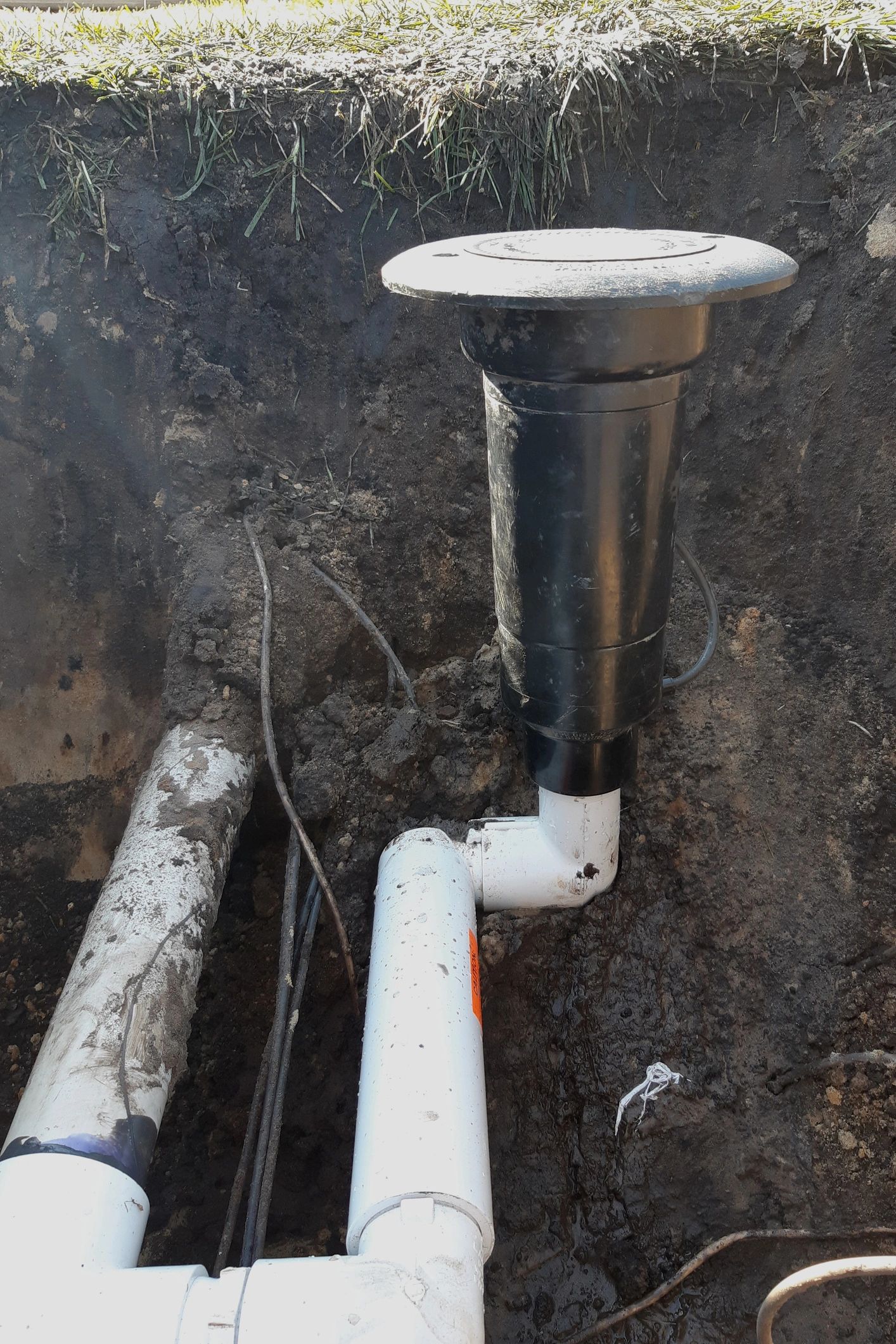 pop-up emitter drainage